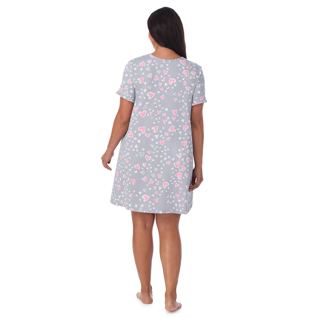 Grey Heart;Model is wearing size 1X. She is 5'10", Bust 40", Waist 33", Hips 47".@A lady wearing Cotton Rich Ruffled Short Sleeve Sleepshirt PLUS