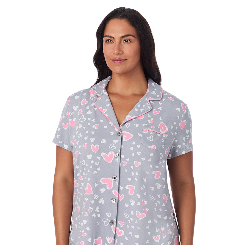 Grey Heart;Model is wearing size 1X. She is 5'10", Bust 40", Waist 33", Hips 47".@A lady wearing Cotton Rich Short Sleeve Notch Collar Top with Cropped Pant Pajama Set PLUS