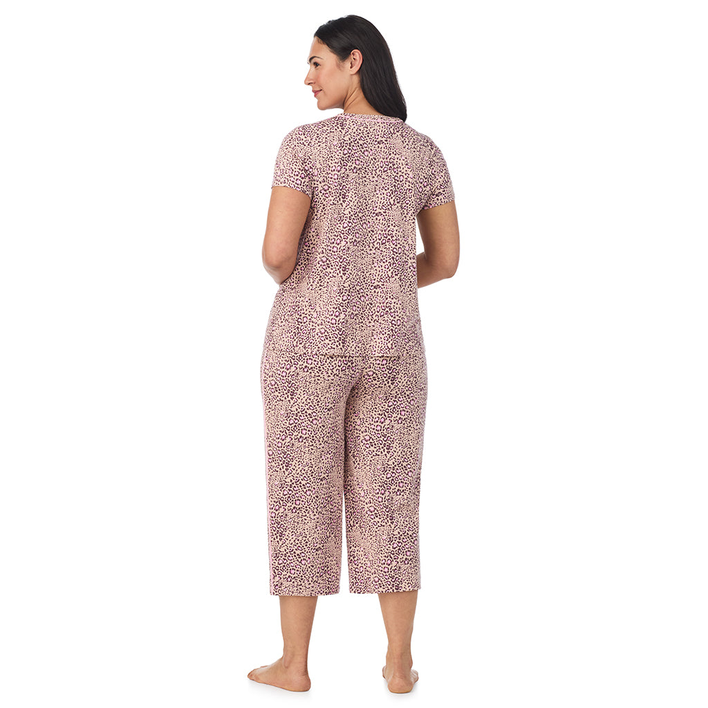 Leopard Animal; Model is wearing size 1X. She is 5'10", Bust 40", Waist 33", Hips 47". @A lady wearing a Leopard Animal Cotton Rich Short Sleeve Top with Cropped Pant Pajama Set PLUS