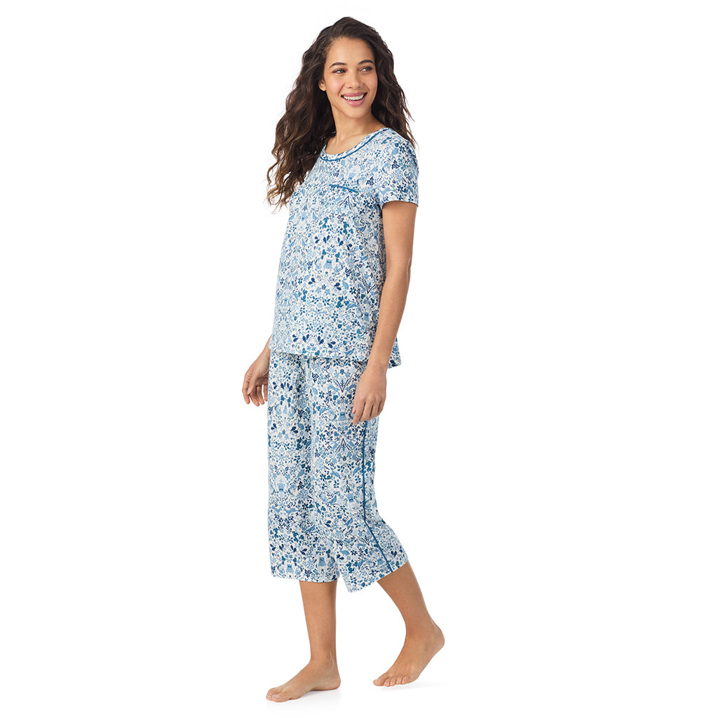 Woodland; Model is wearing size S. She is 5’9”, Bust 34”, Waist 23”, Hips 35”.@A lady wearing a Woodland Cotton Rich Short Sleeve Top with Cropped Pant Pajama Set