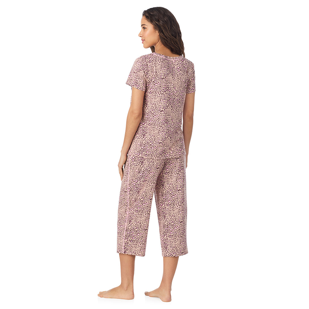 Leopard Animal; Model is wearing size S. She is 5’9”, Bust 34”, Waist 23”, Hips 35”.@A lady wearing a Leopard Animal Cotton Rich Short Sleeve Top with Cropped Pant Pajama Set