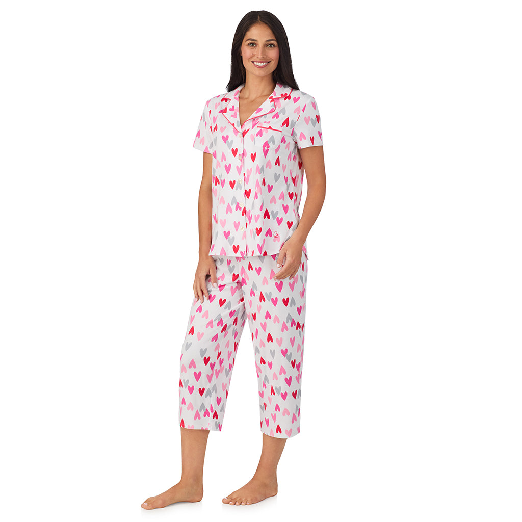 White Multi Heart;Model is wearing size S. She is 5'8.5", Bust 32", Waist 25", Hips 36".@A lady wearing Cotton Rich Short Sleeve Notch Collar Top with Cropped Pant Pajama Set