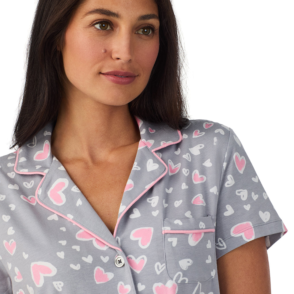 Grey Heart;Model is wearing size S. She is 5'8.5", Bust 32", Waist 25", Hips 36".@A lady wearing Cotton Rich Short Sleeve Notch Collar Top with Cropped Pant Pajama Set
