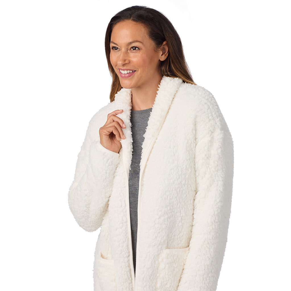 Cream; Model is wearing size S. She is 5'8", Bust 34", Waist 24.5", Hips 35".@A lady wearing Snuggle Up Sherpa Cardi