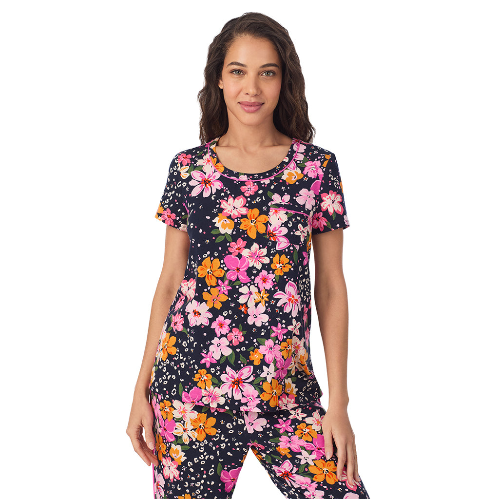 Big Floral; Model is wearing size S. She is 5’9”, Bust 34”, Waist 23”, Hips 35”.@A lady wearing a Big Floral Cotton Rich Short Sleeve Top with Cropped Pant Pajama Set