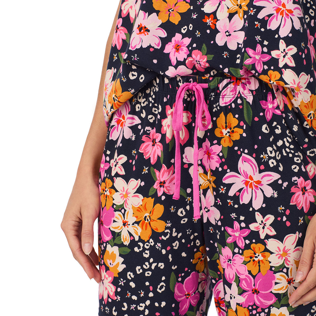 Big Floral; Model is wearing size S. She is 5’9”, Bust 34”, Waist 23”, Hips 35”.@A lady wearing a Big Floral Cotton Rich Short Sleeve Top with Cropped Pant Pajama Set