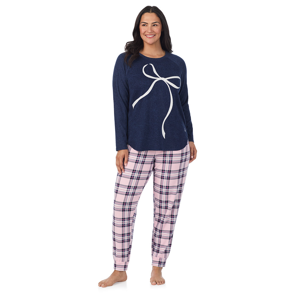Pink Plaid with Bow; Model is wearing size 1X. She is 5'10", Bust 40", Waist 33", Hips 47".@A lady wearing a Pink Plaid with Bow Brushed Sweater Knit Long Sleeve Pajama Set PLUS