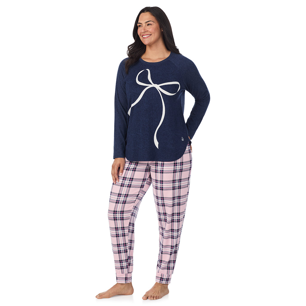 Pink Plaid with Bow; Model is wearing size 1X. She is 5'10", Bust 40", Waist 33", Hips 47".@A lady wearing a Pink Plaid with Bow Brushed Sweater Knit Long Sleeve Pajama Set PLUS