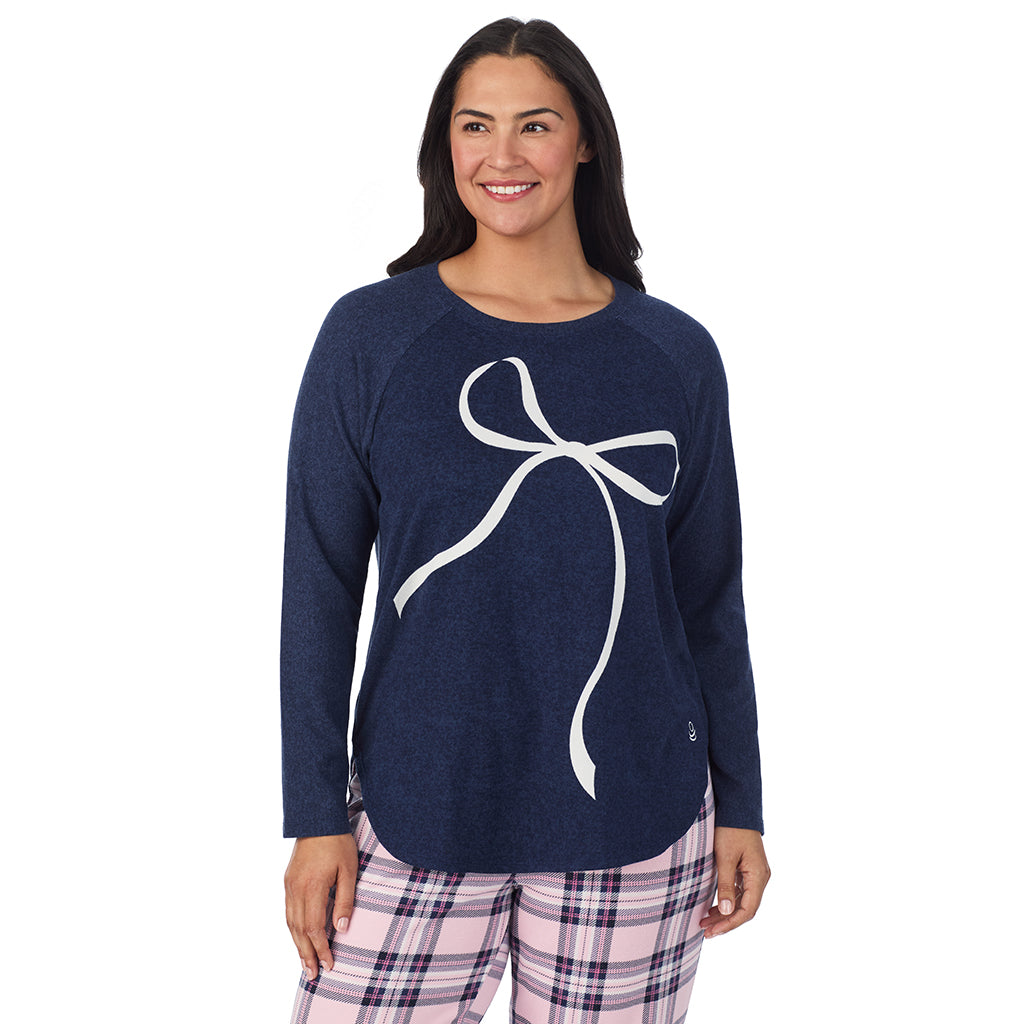 Pink Plaid with Bow; Model is wearing size 1X. She is 5'10", Bust 40", Waist 33", Hips 47".@A lady wearing a Pink Plaid with Bow Brushed Sweater Knit Long Sleeve Pajama Set PLUS