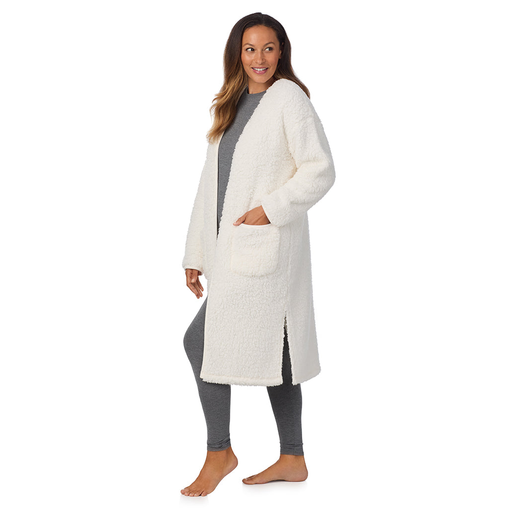 Cream; Model is wearing size S. She is 5'8", Bust 34", Waist 24.5", Hips 35".@A lady wearing Snuggle Up Sherpa Cardi