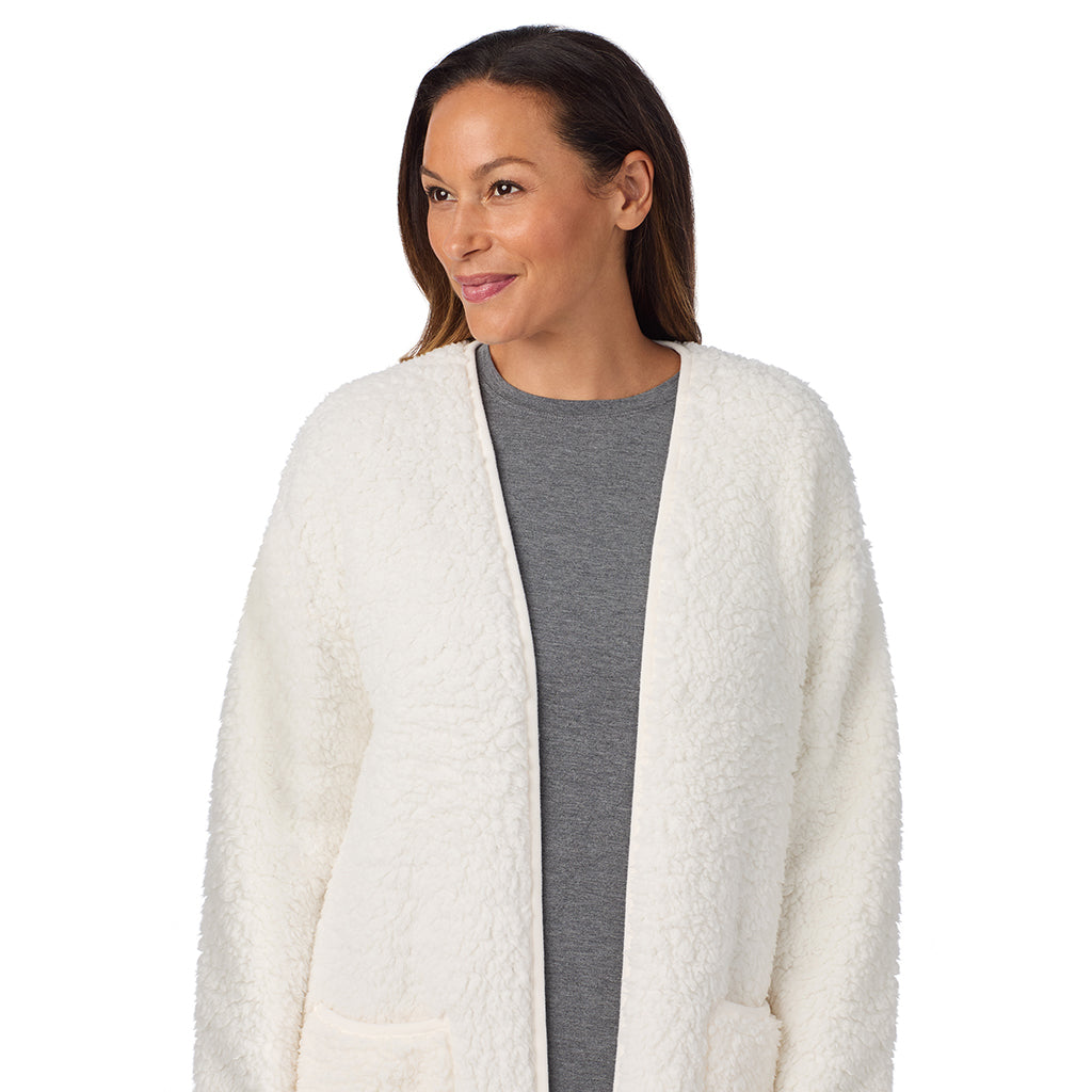 Cream; Model is wearing size S. She is 5'8", Bust 34", Waist 24.5", Hips 35".@A lady wearing Midi Sherpa Cardi