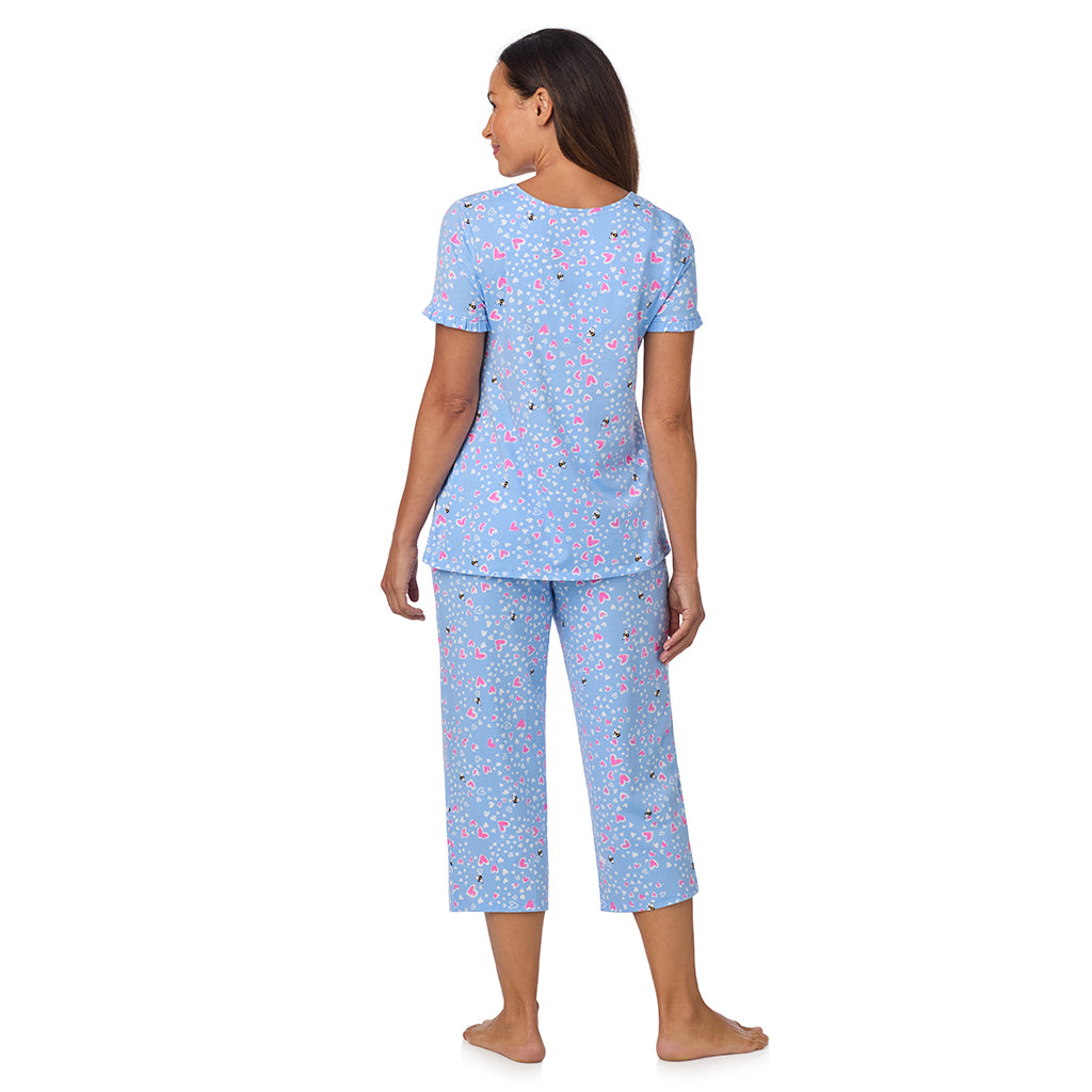Blue Bee Heart; Model is wearing size S. She is 5'8", Bust 34", Waist 24.5", Hips 35".@A lady wearing Cotton Rich Ruffled Short Sleeve Top with Pant Pajama Set