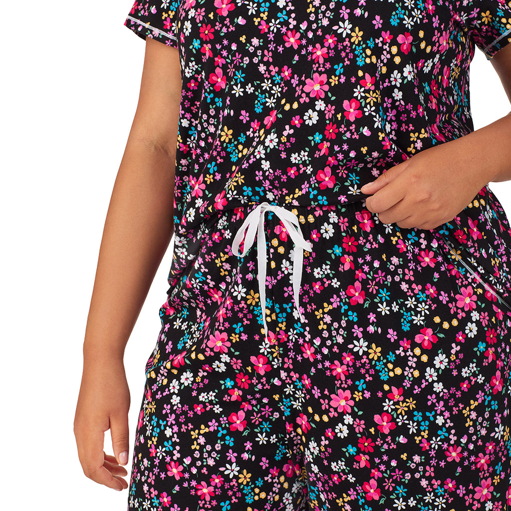 Black Ditsy; Model is wearing size 1X. She is 5'11", Bust 36", Waist 36.5", Hips 47.5". @A lady wearing Cotton-Blend Short Sleeve Top with Cropped Pant 2-Pc Pajama Set PLUS