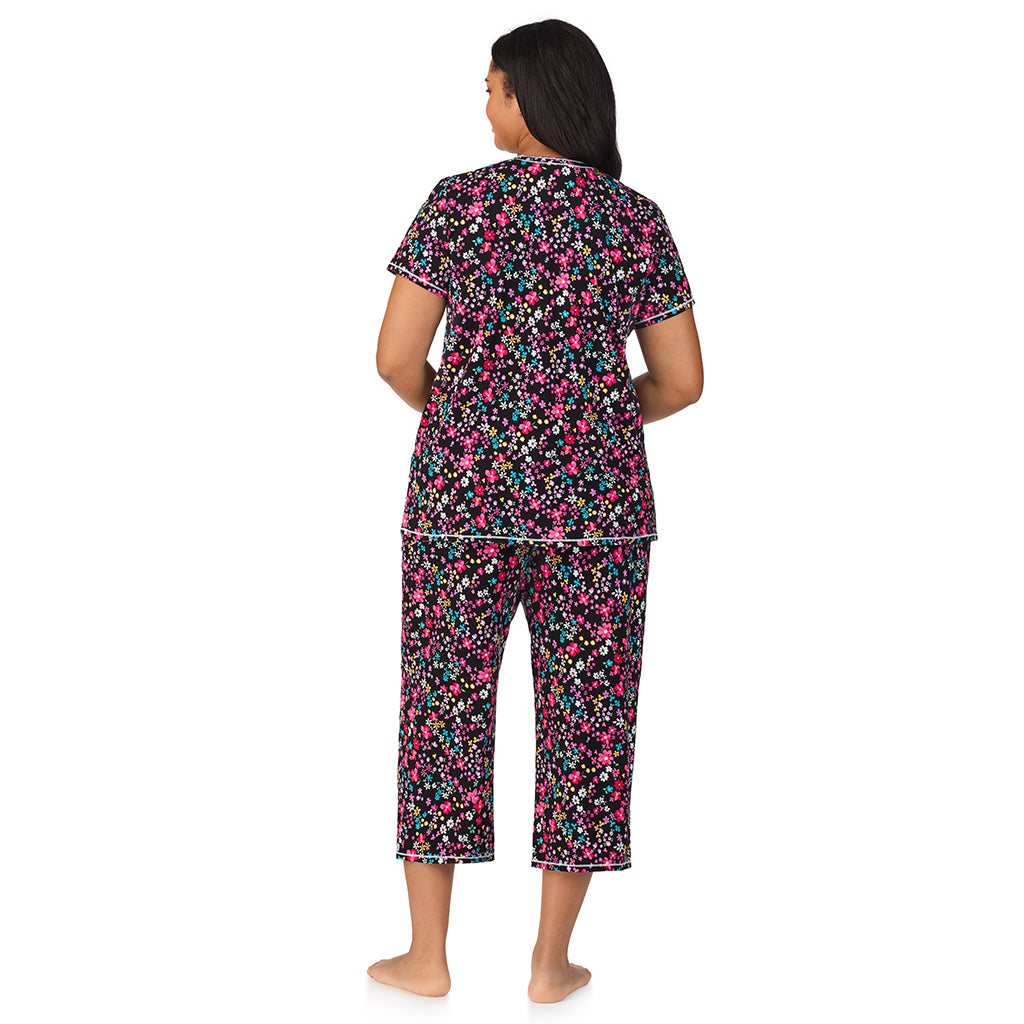Black Ditsy; Model is wearing size 1X. She is 5'11", Bust 36", Waist 36.5", Hips 47.5". @A lady wearing Cotton-Blend Short Sleeve Top with Cropped Pant 2-Pc Pajama Set PLUS