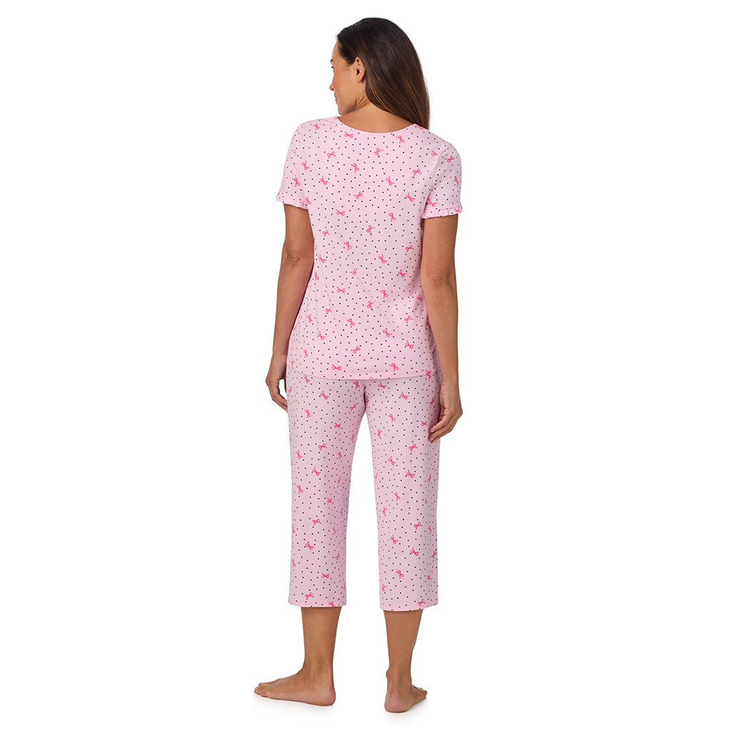 Pink Bow Dot; Model is wearing size S. She is 5'8", Bust 34", Waist 24.5", Hips 35".@A lady wearing Cotton Rich Ruffled Short Sleeve Top with Pant Pajama Set