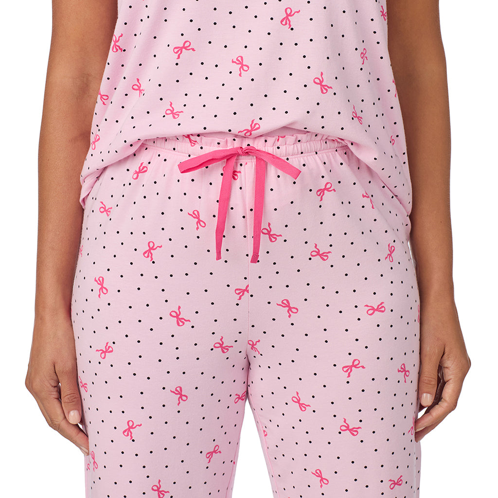Pink Bow Dot; Model is wearing size S. She is 5'8", Bust 34", Waist 24.5", Hips 35".@A lady wearing Cotton Rich Ruffled Short Sleeve Top with Pant Pajama Set