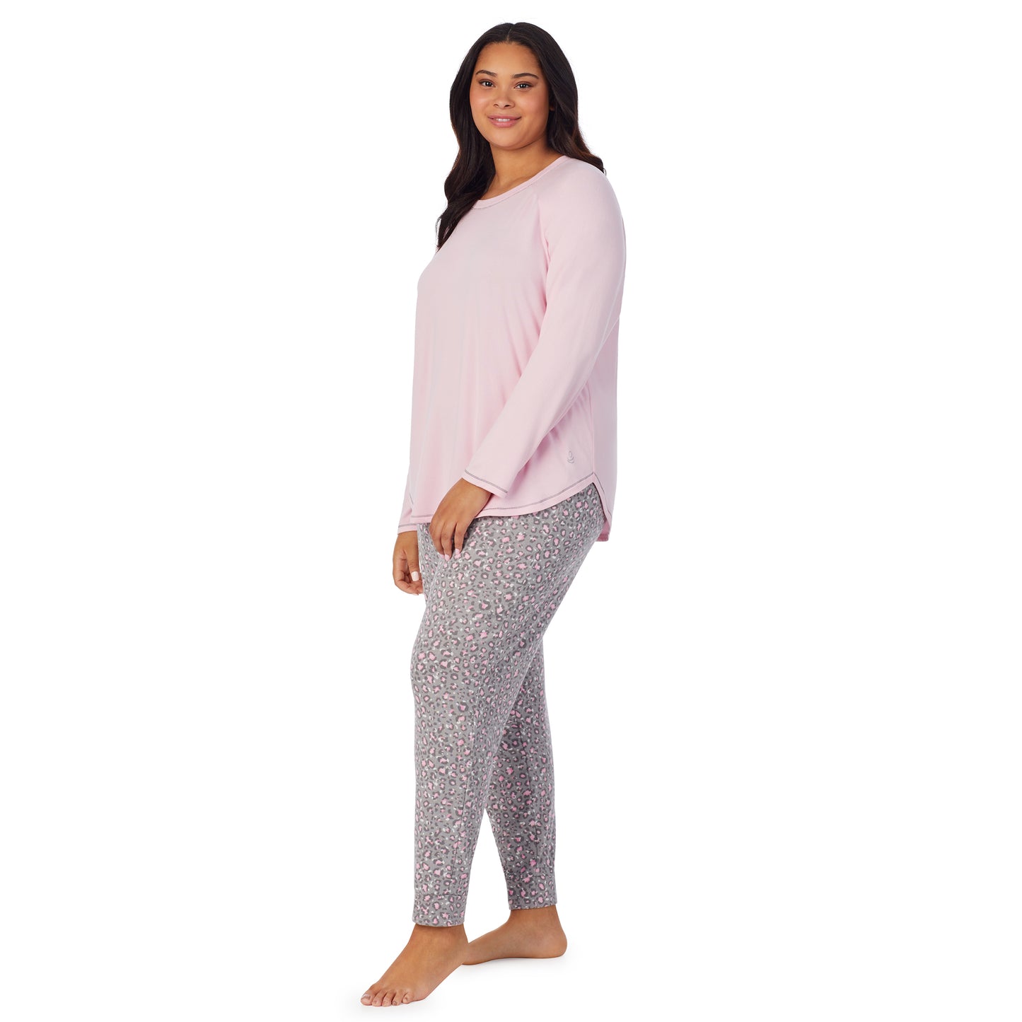 Animal with Pink;Model is wearing size 1X. She is 5'10", Bust 40", Waist 33", Hips 47"@A lady wearing animal with pink brushed sweater knit long sleeve plus pajama set.