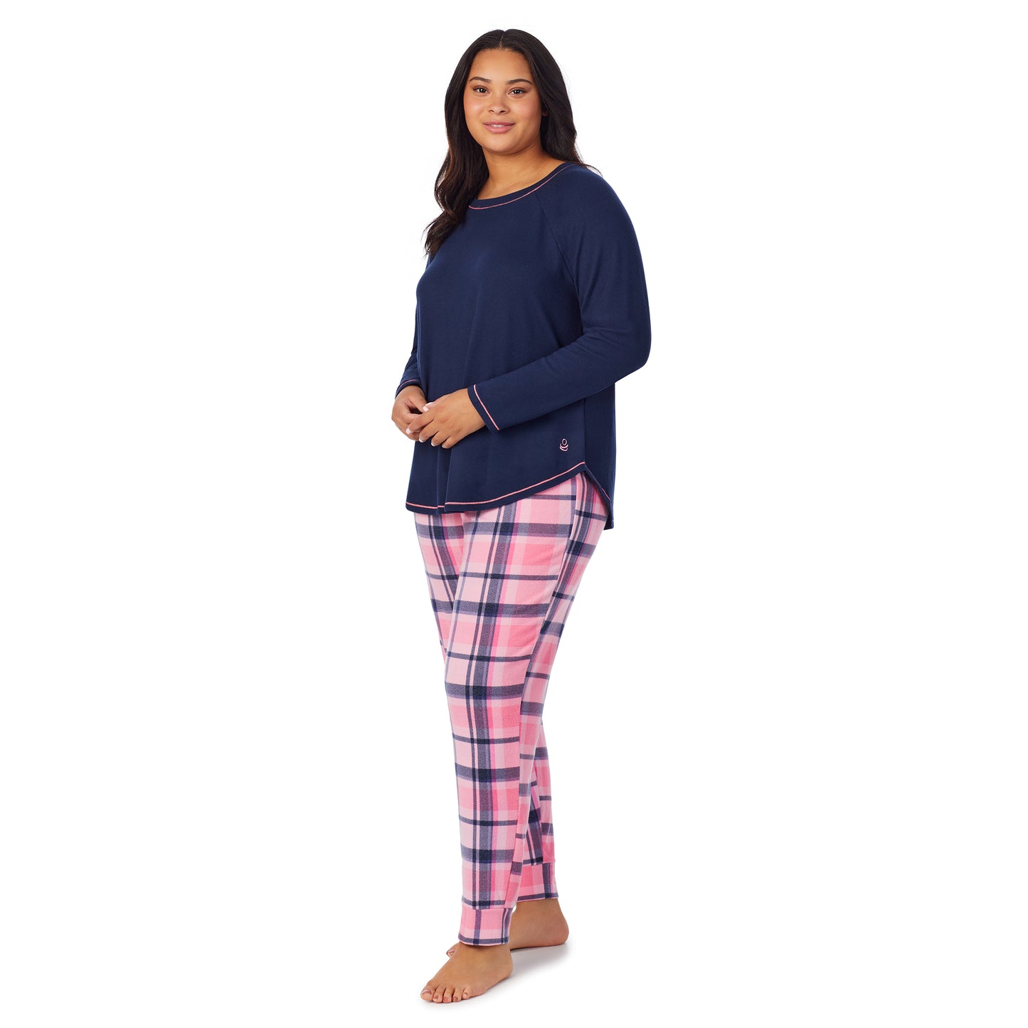 Pink Plaid;Model is wearing size 1X. She is 5'10", Bust 40", Waist 33", Hips 47"@A lady wearing pink plaid brushed sweater knit long sleeve plus pajama set.