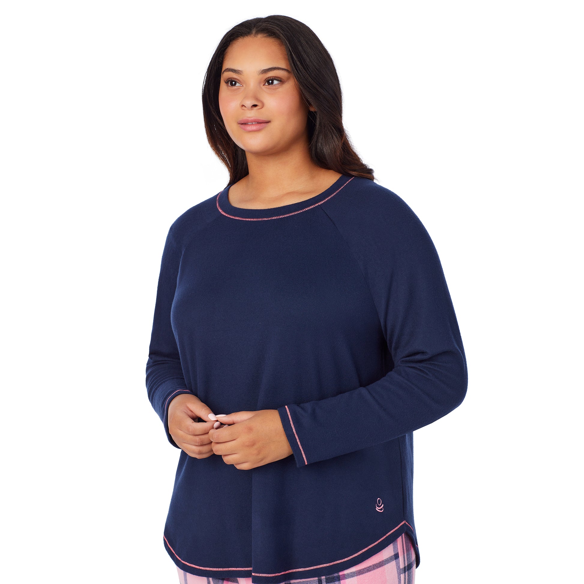 A lady wearing pink plaid brushed sweater knit long sleeve plus pajama set.