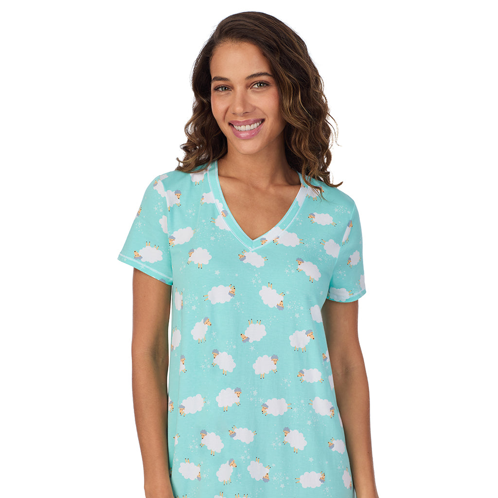 Sheep; Model is wearing size S. She is 5’9”, Bust 34”, Waist 23”, Hips 35”. @A lady wearing Cotton-Blend Short Sleeve V-Neck Sleep Shirt
