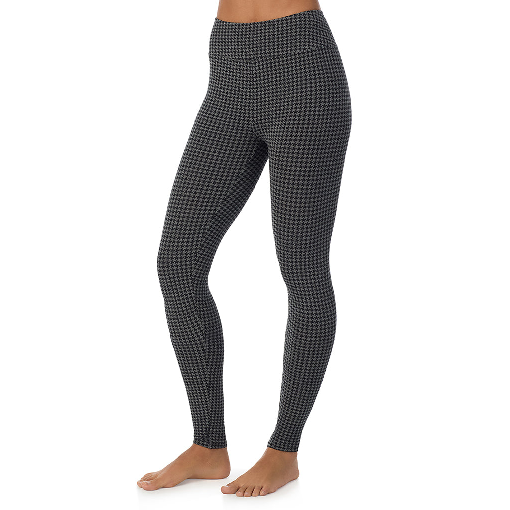 Charcoal Heather Houndstooth; Model is wearing size S. She is 5’9”, Bust 34”, Waist 23”, Hips 35”. @A lady wearing a charcoal heather houndsooth high waist legging.