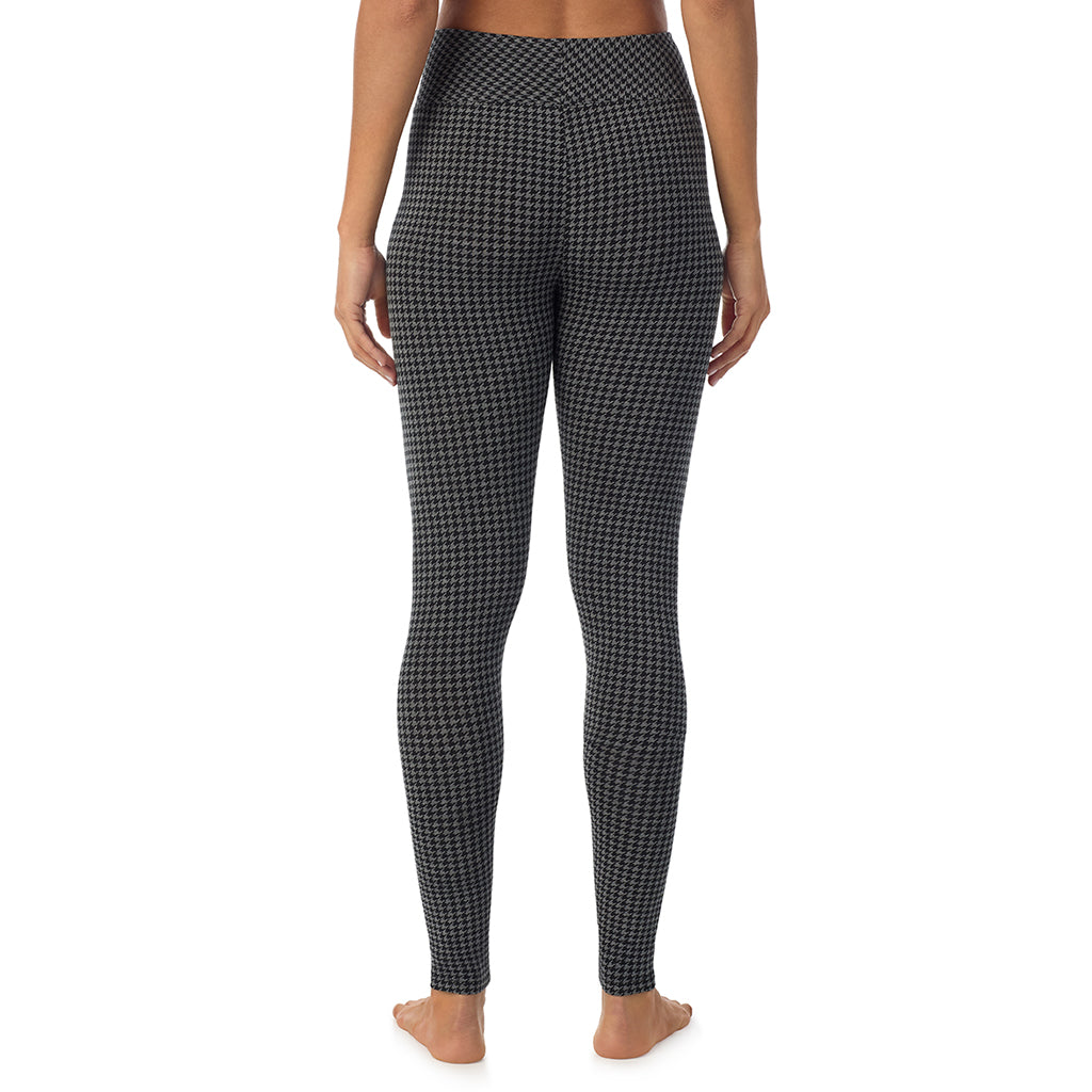 Charcoal Heather Houndstooth; Model is wearing size S. She is 5’9”, Bust 34”, Waist 23”, Hips 35”. @A lady wearing a charcoal heather houndsooth high waist legging.
