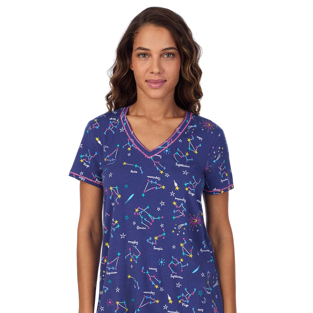 Blue Zodiac;Model is wearing size S. She is 5’9”, Bust 34”, Waist 23”, Hips 35”.@A lady wearing Cotton-Blend Short Sleeve V-Neck Top with Short Pajama Set