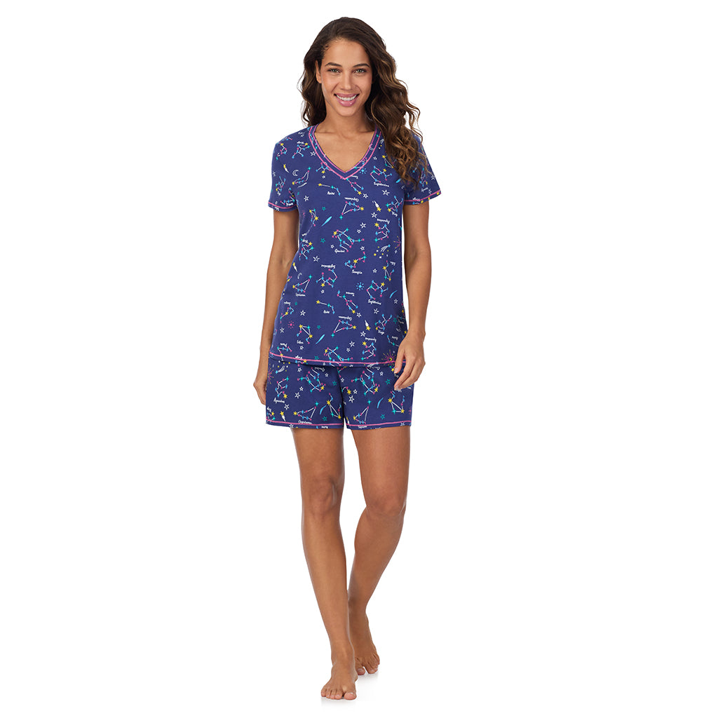 Blue Zodiac;Model is wearing size S. She is 5’9”, Bust 34”, Waist 23”, Hips 35”.@A lady wearing Cotton-Blend Short Sleeve V-Neck Top with Short Pajama Set