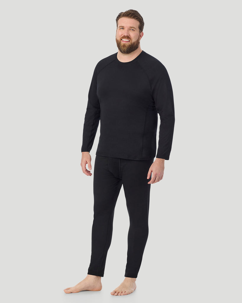 A man wearing Black ArctiCore Long Sleeve Crew Big & Tall in a front view standing pose