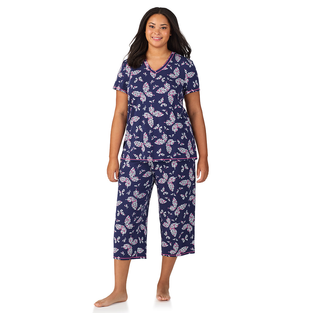 Navy Butterfly Floral; Model is wearing size 1X. She is 5'11", Bust 36", Waist 36.5", Hips 47.5". @A lady wearing Cotton-Blend Short Sleeve Top with Cropped Pant 2-Pc Pajama Set PLUS