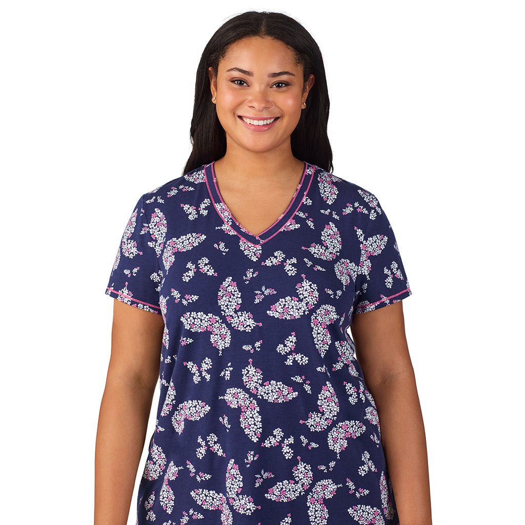Navy Butterfly Floral; Model is wearing size 1X. She is 5'11", Bust 36", Waist 36.5", Hips 47.5". @A lady wearing Cotton-Blend Short Sleeve Top with Cropped Pant 2-Pc Pajama Set PLUS