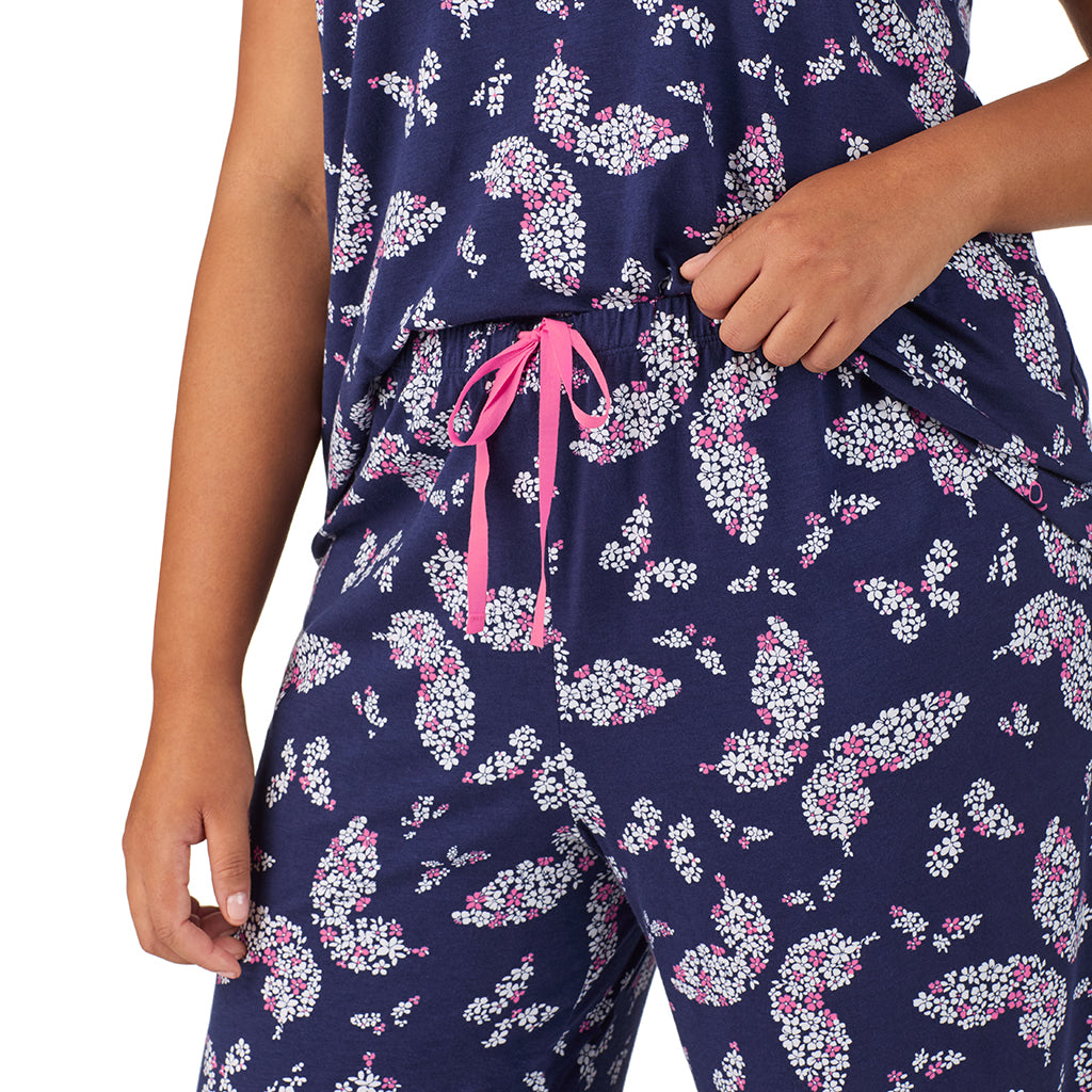 Navy Butterfly Floral; Model is wearing size 1X. She is 5'11", Bust 36", Waist 36.5", Hips 47.5". @A lady wearing Cotton-Blend Short Sleeve Top with Cropped Pant 2-Pc Pajama Set PLUS