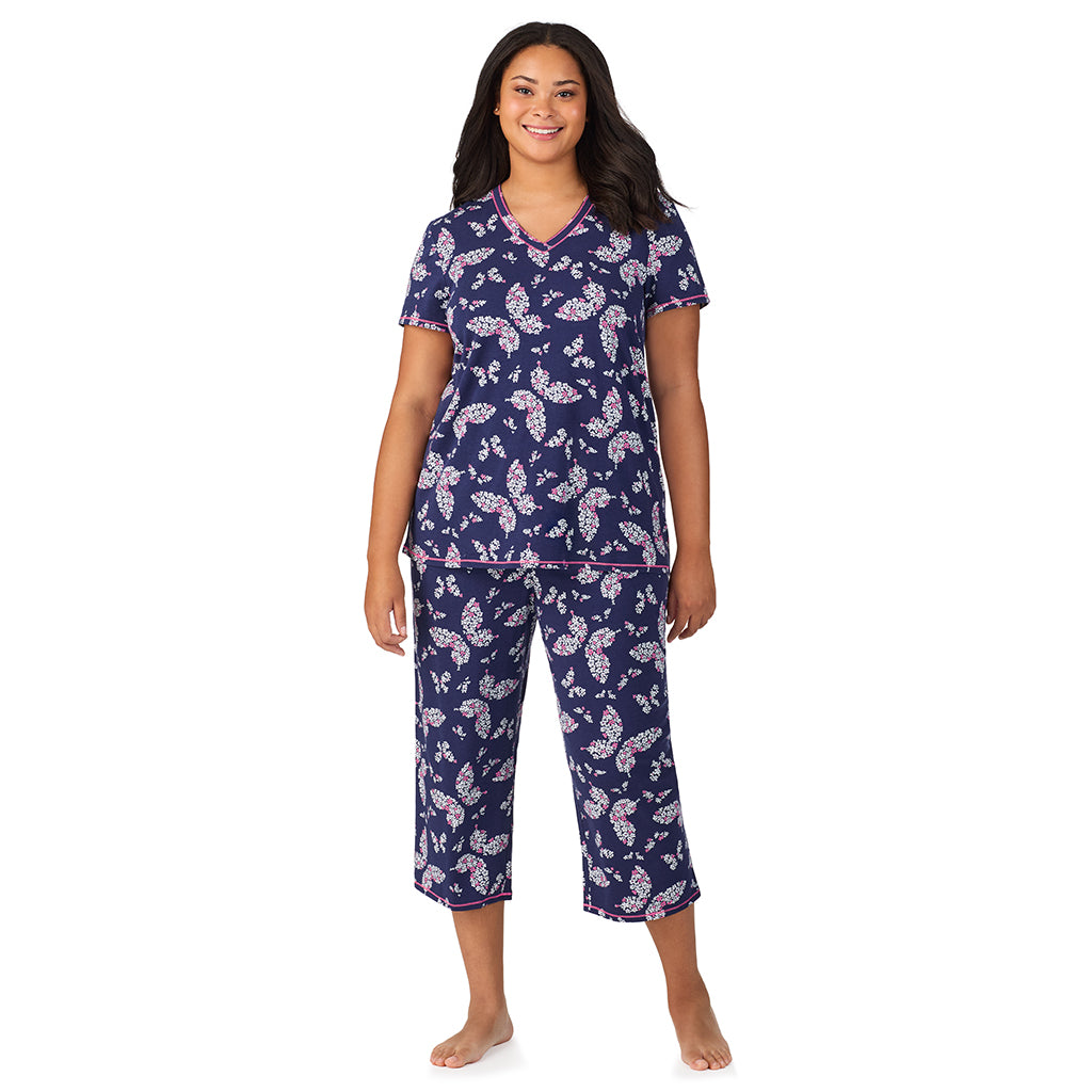 Navy Butterfly Floral; Model is wearing size 1X. She is 5'11", Bust 36", Waist 36.5", Hips 47.5". @A lady wearing Cotton-Blend Short Sleeve Top with Cropped Pant 2-Pc Pajama Set PLUS