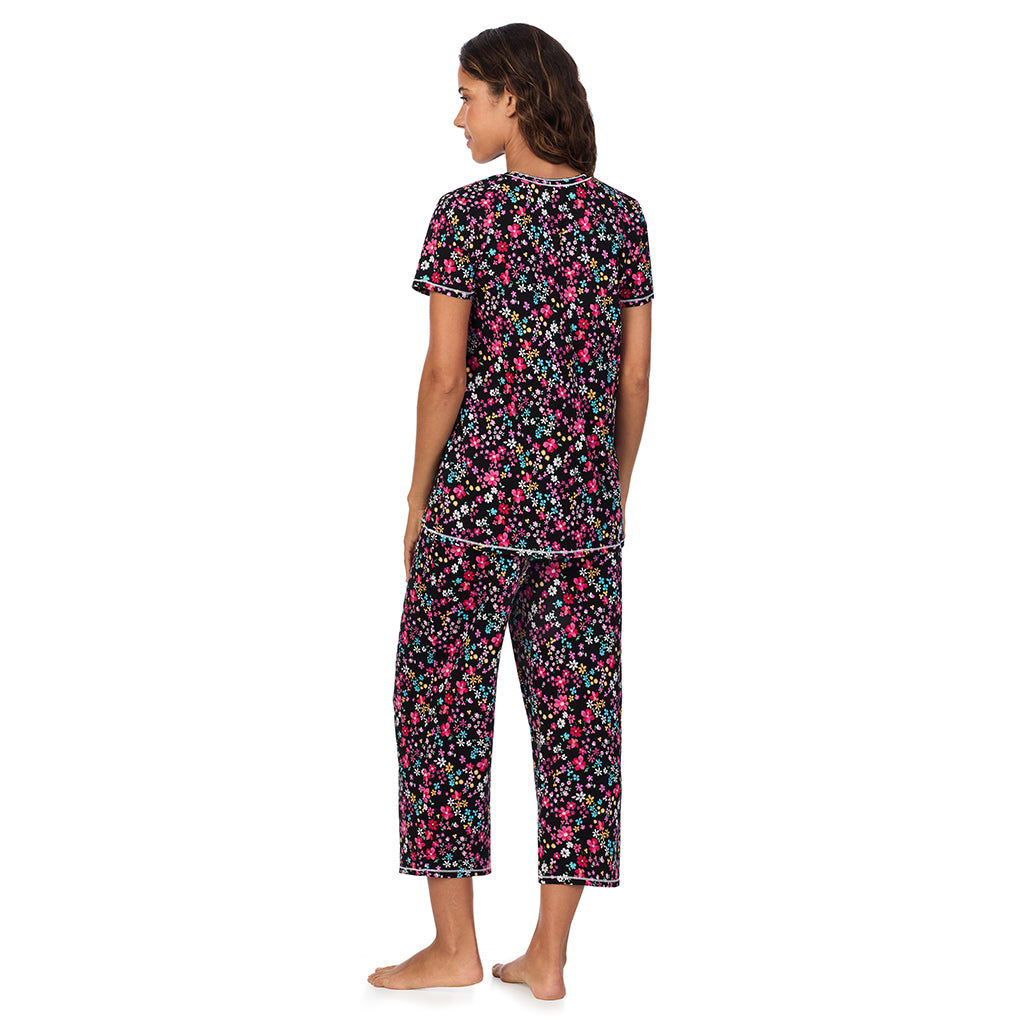 Black Ditsy; Model is wearing size S. She is 5’9”, Bust 34”, Waist 23”, Hips 35”@A lady wearing Cotton-Blend Short Sleeve Top with Cropped Pant 2-Pc Pajama Set