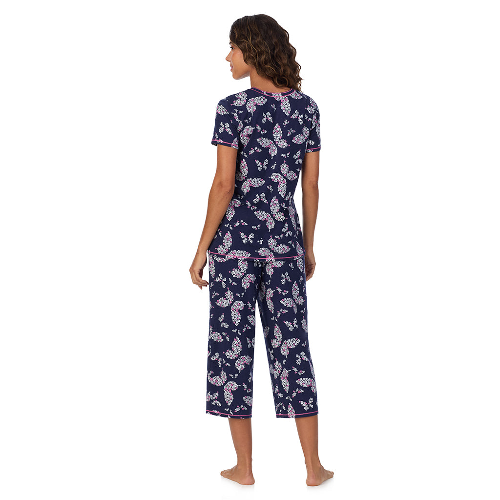 Navy Butterfly Floral; Model is wearing size S. She is 5’9”, Bust 34”, Waist 23”, Hips 35”. @A lady wearing Cotton-Blend Short Sleeve Top with Cropped Pant 2-Pc Pajama Set