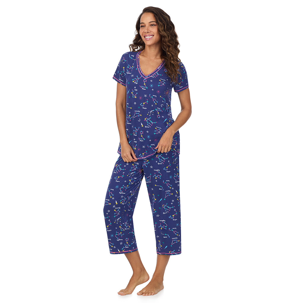 Blue Zodiac; Model is wearing size S. She is 5’9”, Bust 34”, Waist 23”, Hips 35”.@A lady wearing Cotton-Blend Short Sleeve Top with Cropped Pant 2-Pc Pajama Set
