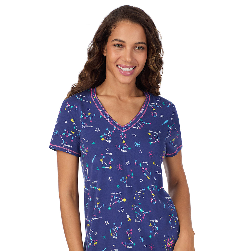 Blue Zodiac; Model is wearing size S. She is 5’9”, Bust 34”, Waist 23”, Hips 35”.@A lady wearing Cotton-Blend Short Sleeve Top with Cropped Pant 2-Pc Pajama Set
