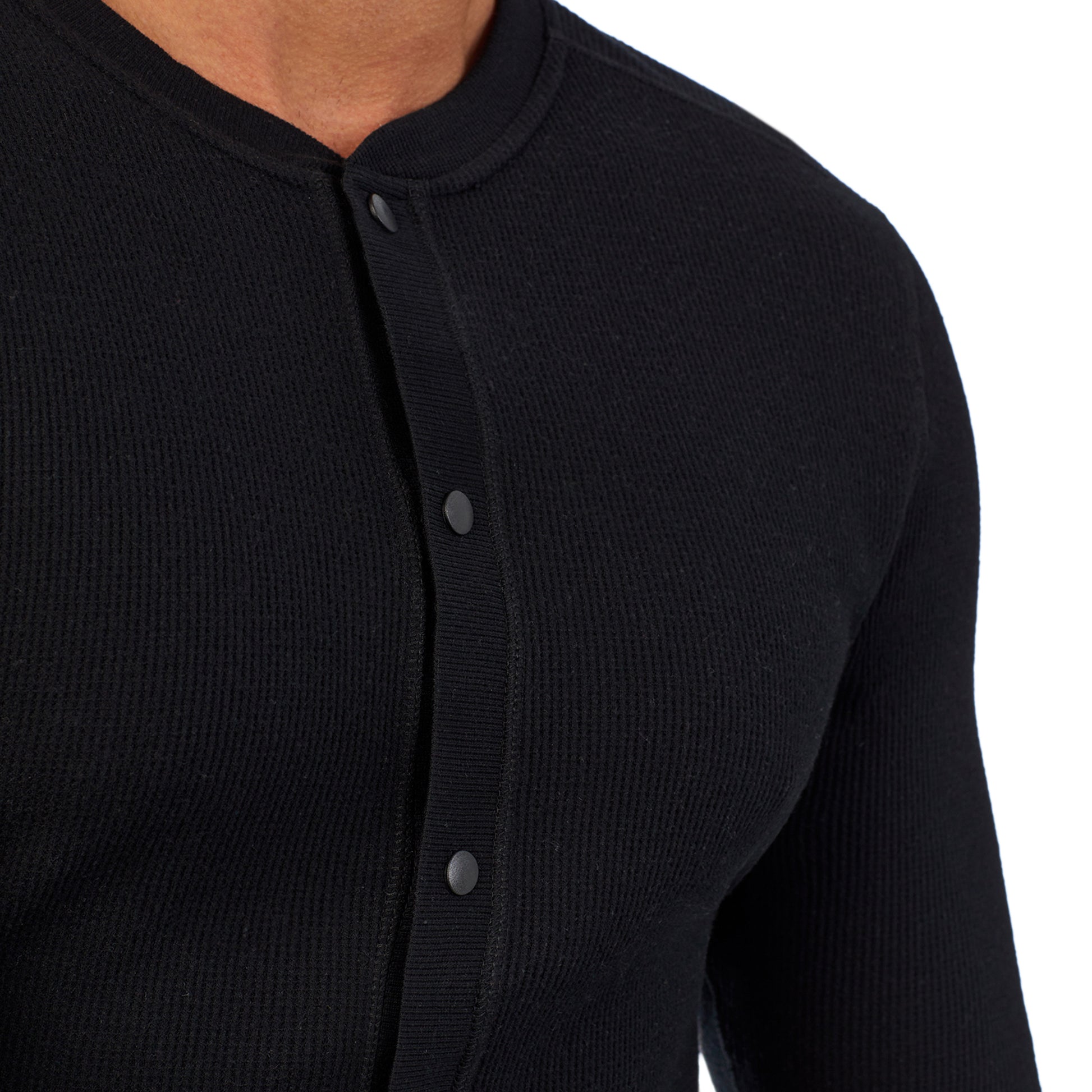 Black;Model is wearing size M. He is 6'2", Waist 32", Inseam 34".@A man wearing black Waffle Thermal Button Front Union Suit