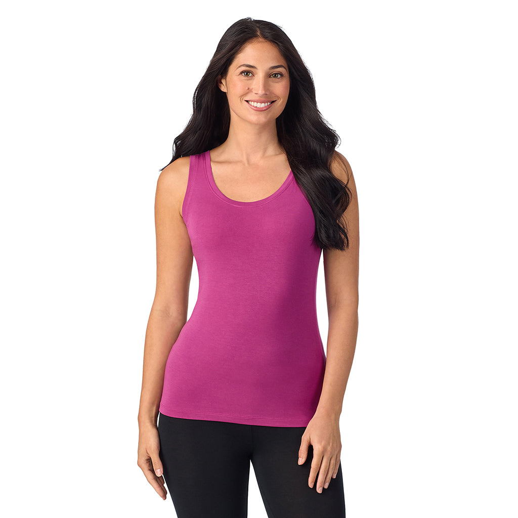 Baton Rouge; Model is wearing size S. She is 5'8.5", Bust 32", Waist 25", Hips 36". @A lady wearing baton Rouge sleeveless reversible tank.
