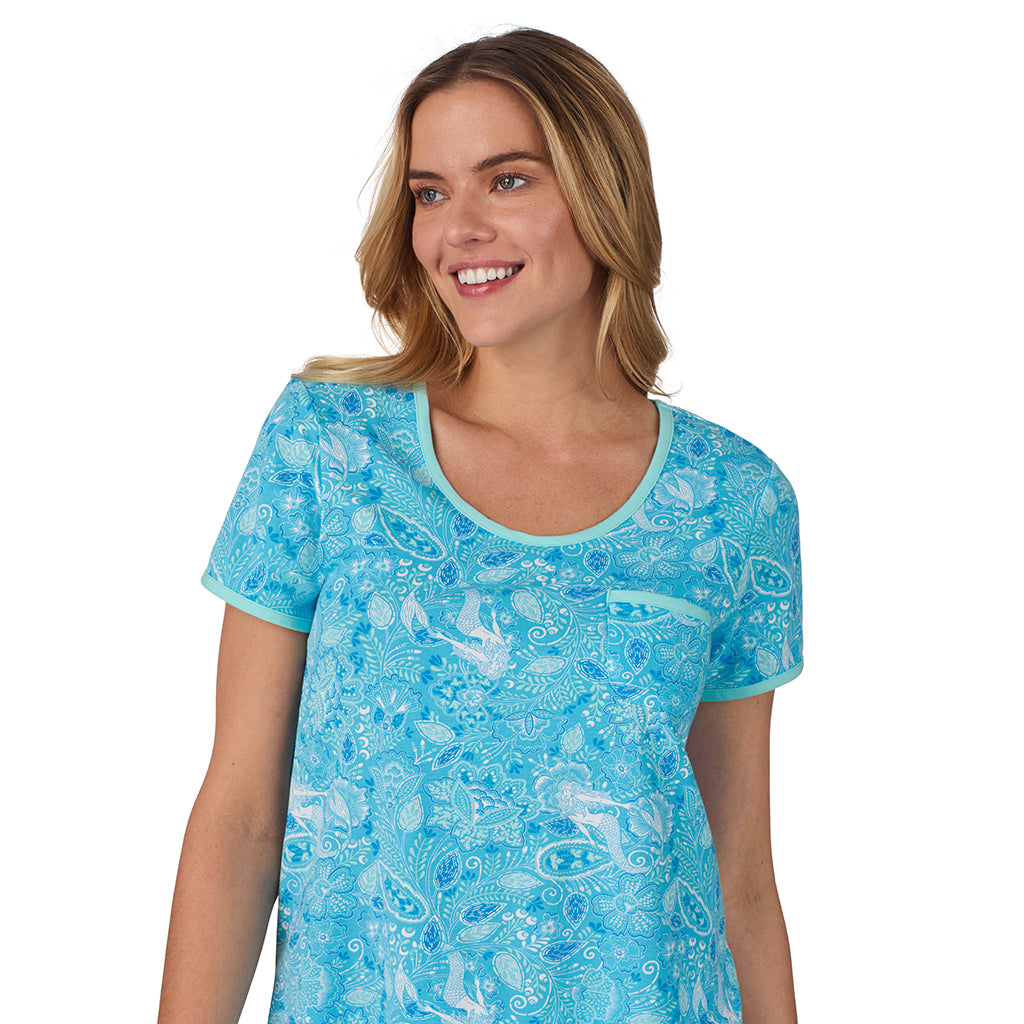 Mermaid Floral;Model is wearing size S. She is 5’10”, Bust 34”, Waist 26", Hips 38”.@ A lady wearing blue short sleeve top with short pajama set with Mermaid Floral print