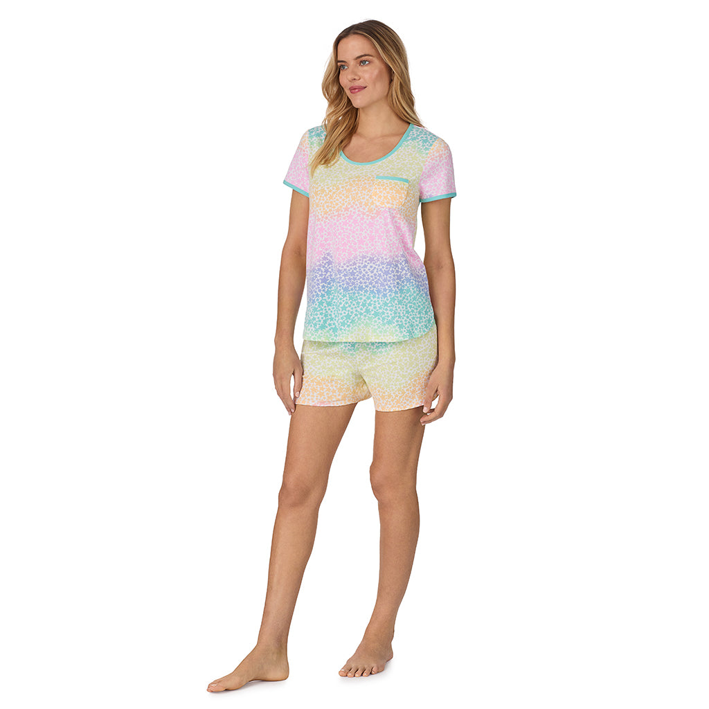 Rainbow Star;Model is wearing size S. She is 5’10”, Bust 34”, Waist 26", Hips 38”.@ A lady wearing sleeve top with short pajama set with rainbow star print