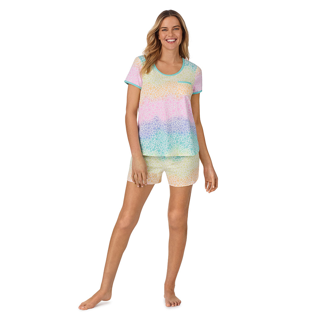 Rainbow Star;Model is wearing size S. She is 5’10”, Bust 34”, Waist 26", Hips 38”.@ A lady wearing sleeve top with short pajama set with rainbow star print