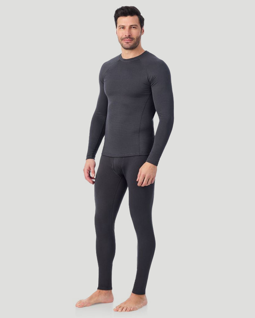 A man wearing a asphalt X fleece long sleeve crew side pose