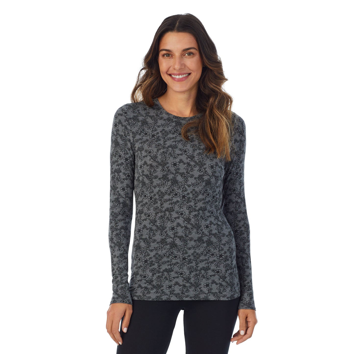 Heather Grey Floral; Model is wearing size S. She is 5’9”, Bust 34”, Waist 25.5”, Hips 36.5”. @A lady wearing a Heather Grey Floral long sleeve stretch crew.