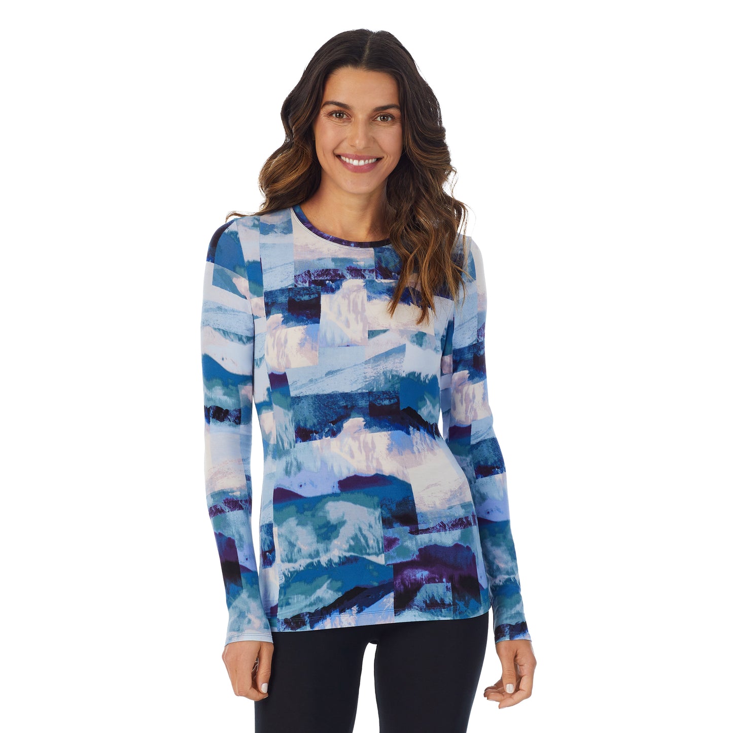 Blue Scenic; Model is wearing size S. She is 5’9”, Bust 34”, Waist 25.5”, Hips 36.5”. @A lady wearing a Blue Scenic long sleeve stretch crew.