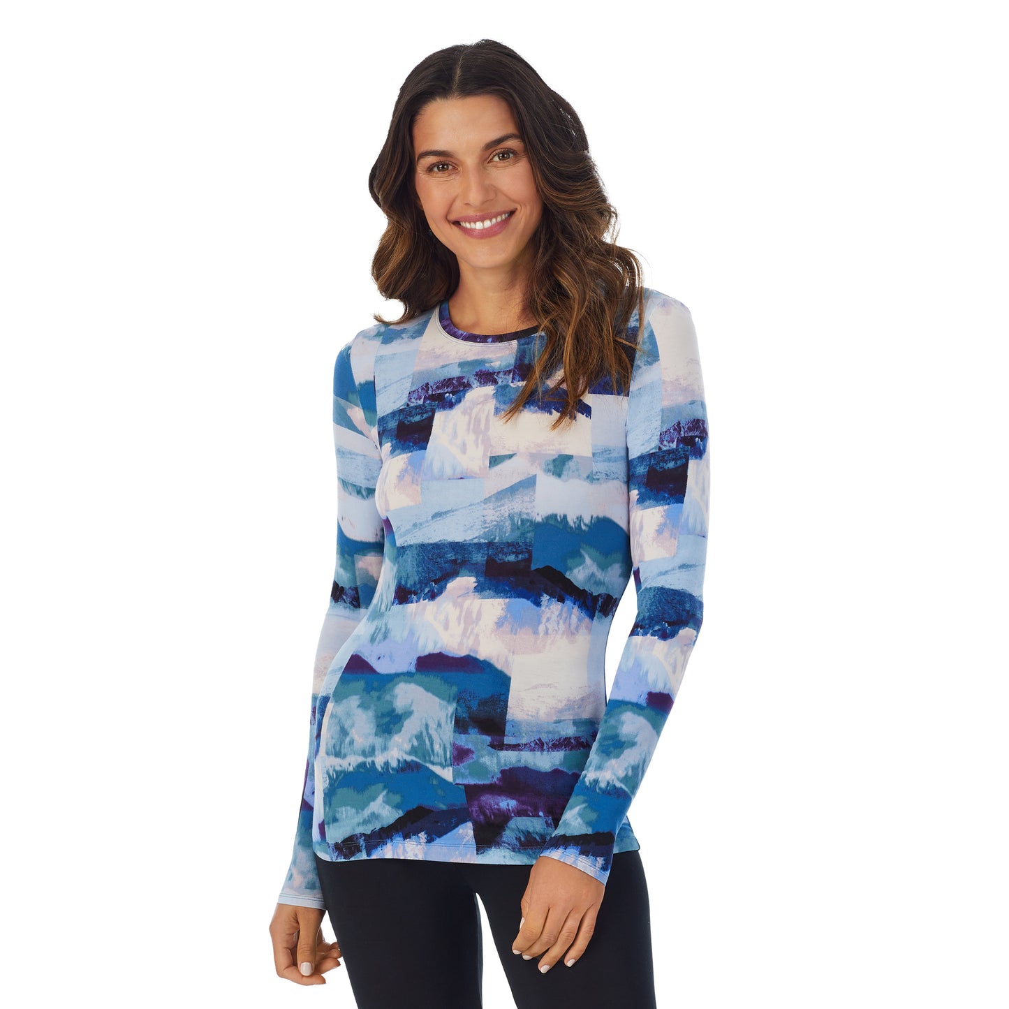 Blue Scenic; Model is wearing size S. She is 5’9”, Bust 34”, Waist 25.5”, Hips 36.5”. @A lady wearing a Blue Scenic long sleeve stretch crew.