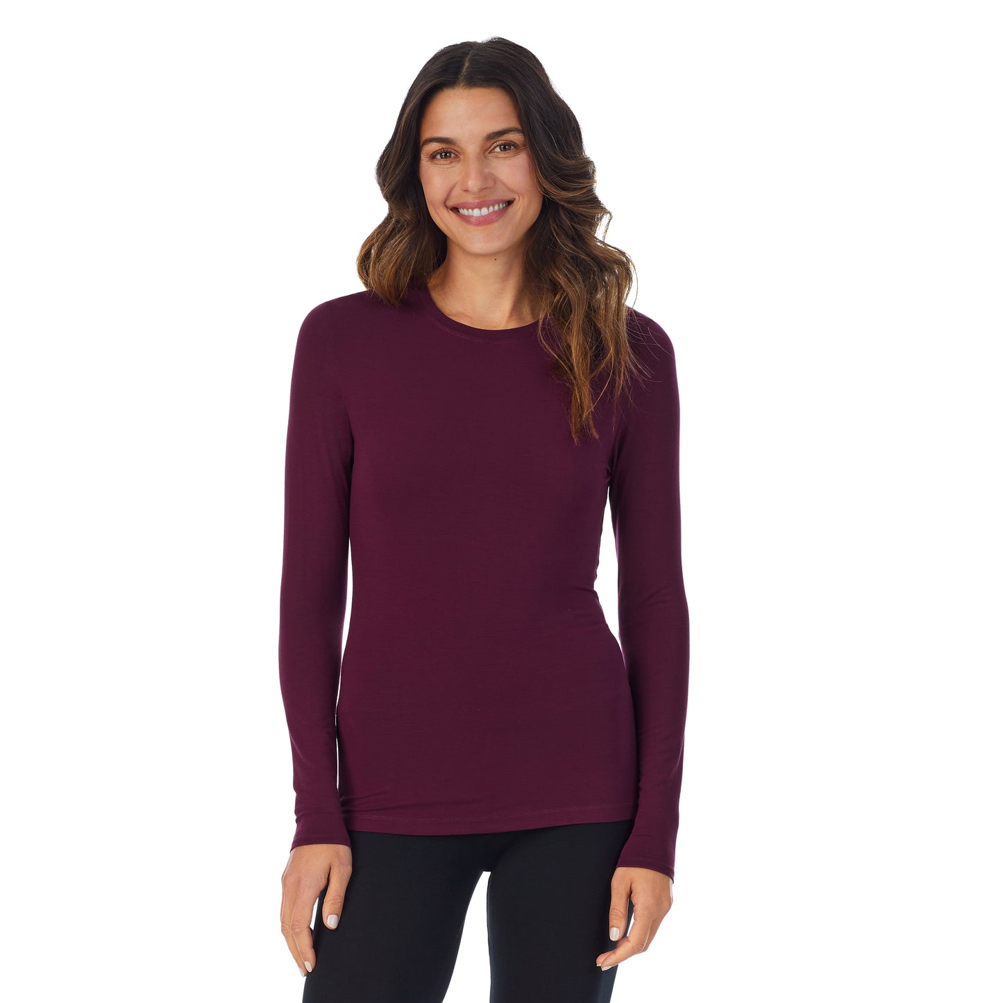 Purple Beet; Model is wearing size S. She is 5’9”, Bust 34”, Waist 25.5”, Hips 36.5”. @A lady wearing a Purple Beet long sleeve stretch crew.