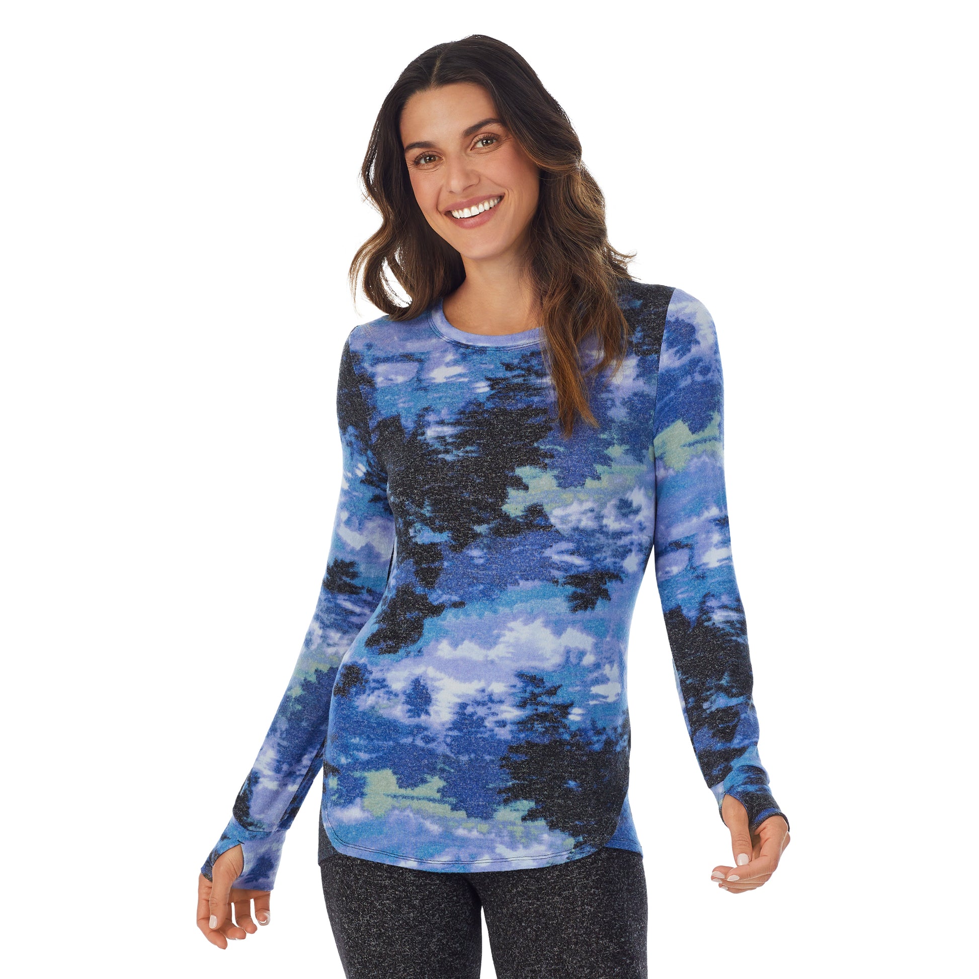 A lady wearing a misty forest long sleeve crew.