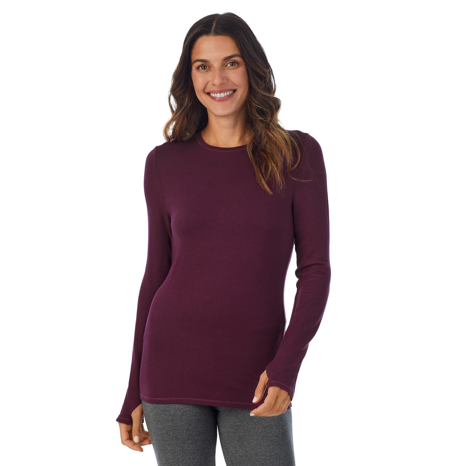 A lady wearing a Purple Beet Heather long sleeve crew.