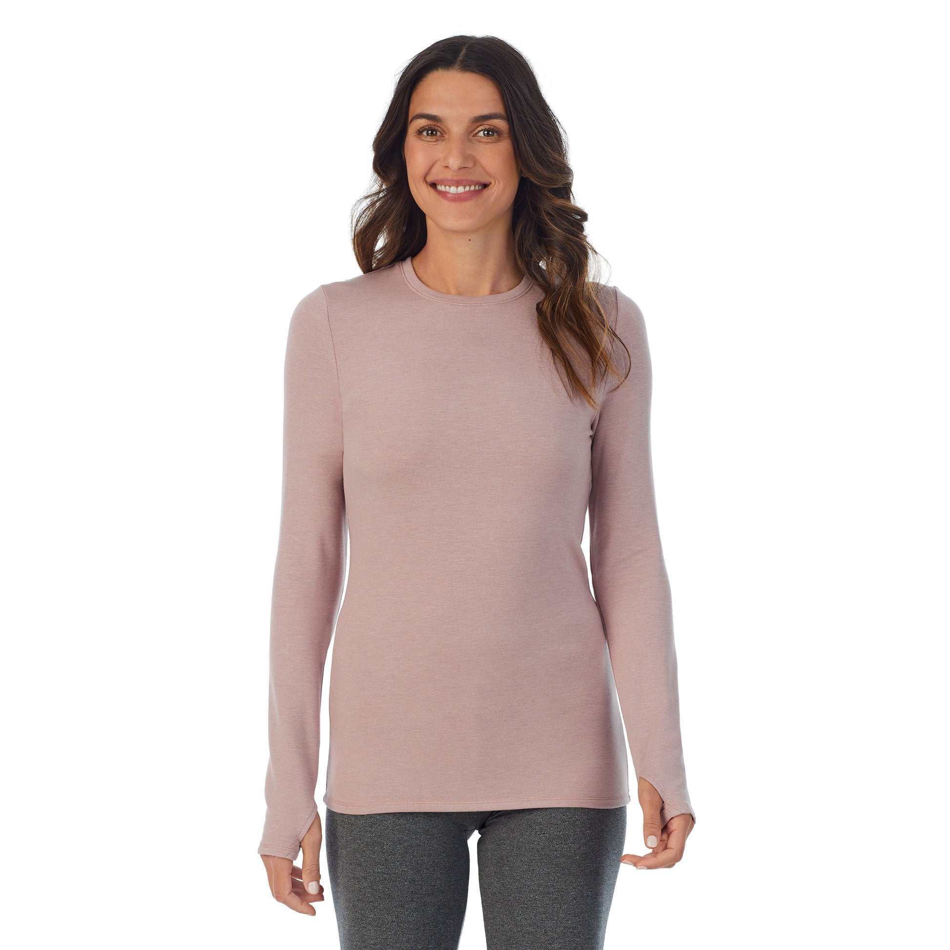 A lady wearing a Mauve Shadow Heather long sleeve crew.